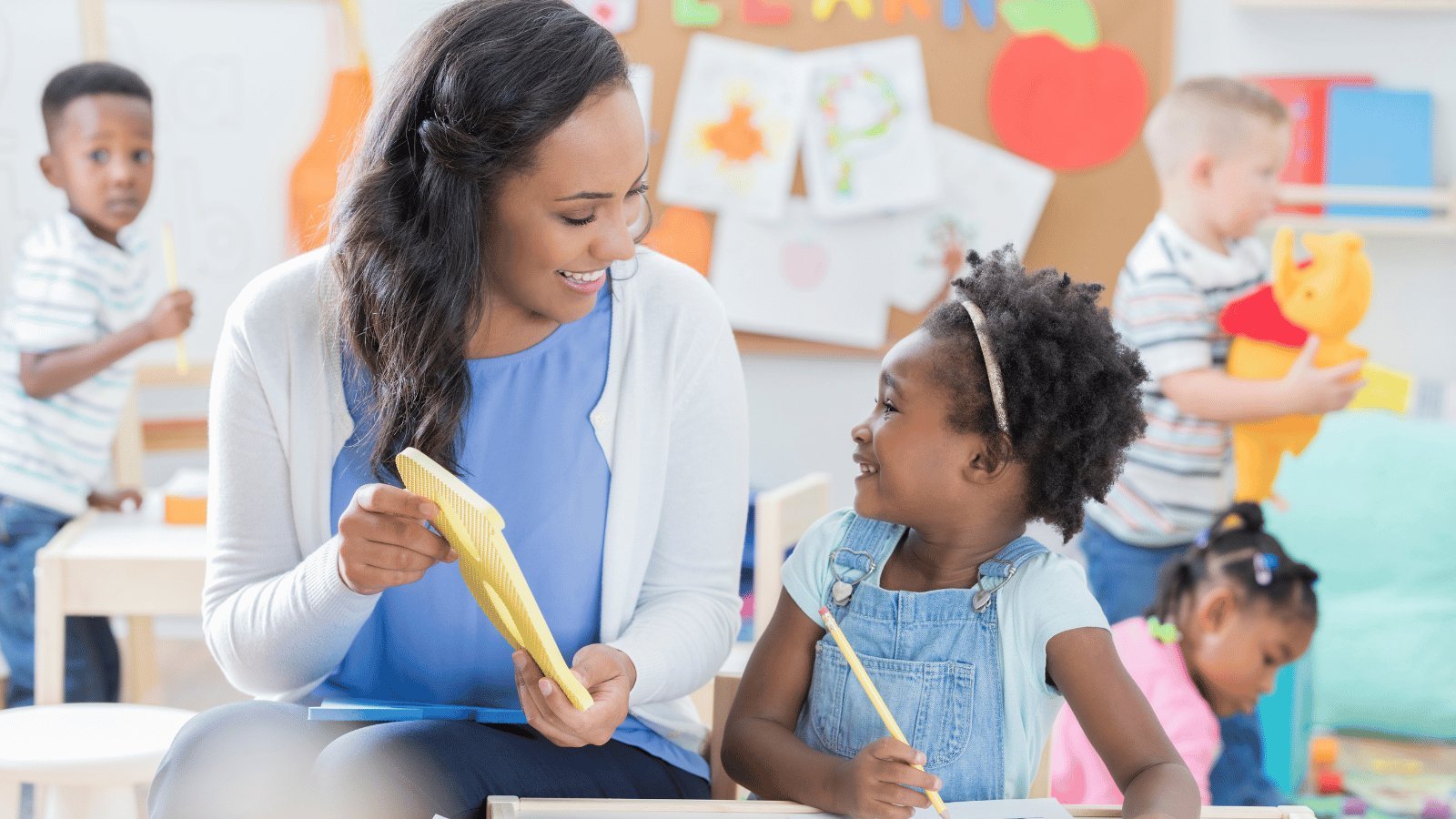 children learning with teacher